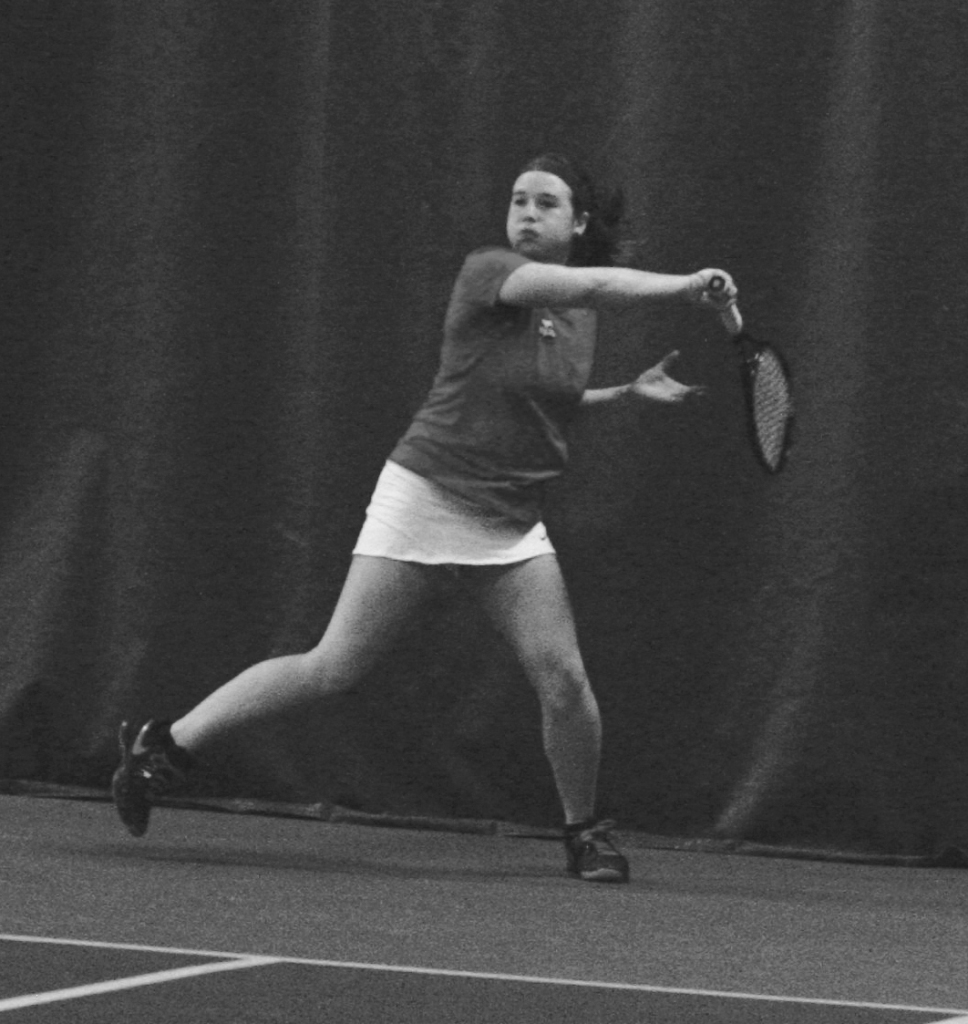 Taylor Hawkins ‘16 takes a swing during the tennis match. 